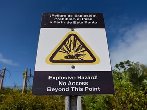 Tons of unexploded bombs, rockets and other munitions still lie scattered across the eastern half of the island and the surrounding seabed.