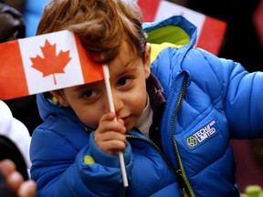 Zawenawedian Dawdian, 2, was one of a group of sponsored Syrian refugees who arrived in Toronto yesterday gathered at the Armenian Cultural Centre where they were paired up with their sponsored families on Wednesday December 16, 2015.