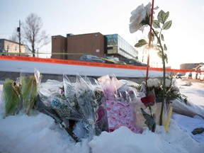 Flowers at a makeshift memorial near the Islamic Cultural Center in Quebec City following a deadly shooting there on Jan. 29, 2017.