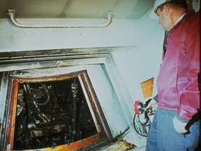 This 1967 file photo shows the charred interior of the Apollo I spacecraft after a fire which killed astronauts Ed White, Roger Chaffee, and Virgil Grissom on Jan. 27, 1967