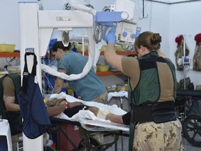 Canadian Armed Forces medical personnel X-ray a simulated patient during an exercise scenario at the Role 2 medical facility in Northern Iraq during Operation IMPACT on November 7, 2016.