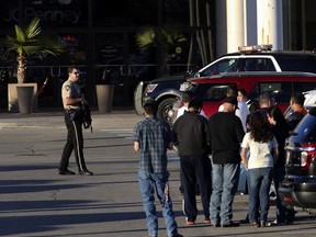 Law enforcement personnel work the scene after a deadly shooting at Rolling Oaks Mall in San Antonio, Texas, Sunday, Jan. 22, 2017