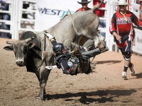 The mother of Ty Pozzobon, a Canadian bull riding champion from Merritt, B.C., who was found dead Monday, is warning about the dangers of concussions.