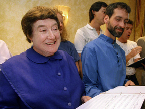 Sister Frances Carr, left, and Brother Arnold Hadd of the Shaker Village in Sabbathday Lake, Maine, sing in 1995.