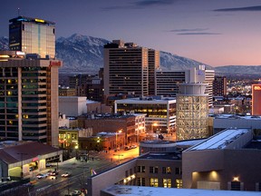 As the sun slips behind the mountains, the nighttime glow of downtown Salt Lake City begins to emerge.