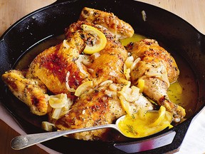 Lemons and garlic flavour a simple roast chicken dinner in this easy-going dish by Ina Garten, the Barefoot Contessa.