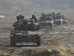 In this Jan. 11, 2015 file photo, South Korean army K-55 self-propelled artillery vehicles move during a military exercise near the demilitarized zone between the two Koreas in Paju, South Korea.