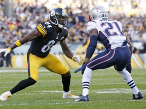 In this Oct. 23, 2016, file photo, Pittsburgh Steelers wide receiver Antonio Brown lines up against New England Patriots cornerback Malcolm Butler during the first half of an NFL football game in Pittsburgh. The Steelers and Patriots meet in the AFC championship game on Sunday, Jan. 22.