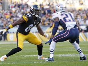 In this Oct. 23, 2016, file photo, Pittsburgh Steelers wide receiver Antonio Brown (left) lines up against New England Patriots cornerback Malcolm Butler.