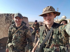 Nazzareno Tassone, left, with Ryan Lock. Both were killed in Syria on Dec. 21, according to the Kurdish YPG militia.