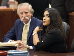 Alexandria Vera, a former Houston-area middle school teacher, sits with her attorney Ricardo Rodriguez as they wait for her hearing to begin, Friday, Jan. 13, 2017