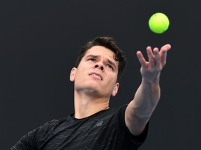 Canada's Milos Raonic serves during a practice session ahead of the Australian Open in Melbourne on Jan. 15.
