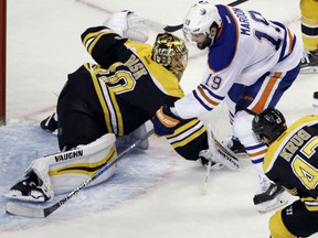 Patrick Maroon of the Edmonton Oilers scores his third goal of the game past Boston Bruins' goaltender Tuukka Rask in NHL action Thursday night in Boston. The Oilers posted their first victory in Boston since 1996 with a 4-3 win.