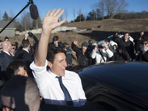 Prime Minister Justin Trudeau waves to the crowd after a visit to a Tim Hortons in Hampton, N.B. on Tuesday, Jan. 17. The so-called listening tour has likely played well domestically, but perhaps Trudeau needs to stop being so darn nice.