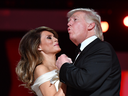 U.S. President Donald Trump sings along with the music as he dances with First Lady Melania Trump at the Liberty Ball at the Washington Convention Center on Jan. 20