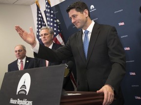 House Speaker Paul Ryan of Wis., joined by, from left, House Majority Whip Steve Scalise of La., and House Majority Leader Kevin McCarthy of Calif., meets with reporters on Capitol Hill in Washington, Tuesday, Jan. 24, 2017.