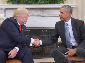 U.S. President Barack Obama shakes hands as he meets with Republican President-elect Donald Trump on transition planning in the Oval Office at the White House on Nov. 10, 2016 in Washington, D.C. Trump has said that he hates shaking hands.