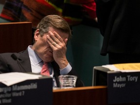 Mayor John Tory listens to city council debates road tolls  at City Hall  in Toronto, Ont. on Tuesday December 13, 2016.