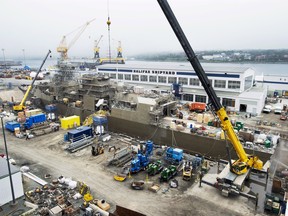 HMCS St. John's, one of Canada's Halifax-class frigates, undergoes a mid-life refit at the Irving Shipbuilding facility in Halifax on Thursday, July 3, 2014.