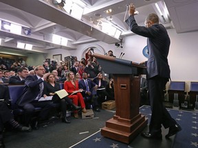President Barack Obama waves at the conclusion of the last news conference of his presidency in the Brady Press Briefing Room at the White House January 18, 2017 in Washington, DC. This was Obama's final question-and-answer session with reporters before Donald Trump is sworn in on Friday.