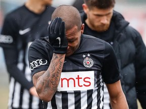 Partizan Belgrade's Brazilian midfielder Everton Luiz leaves the field in tears on February 19, 2017, at the end of a Serbian championship match between Partizan and Rad, after racist remarks from Rad's supporters, Serbian television B92 reported.