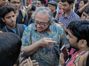Tarek Fatah argues with crowd at an Urdu festival in New Delhi. Fatah's Indian TV show has generated a huge audience, as well as complaints and threats.