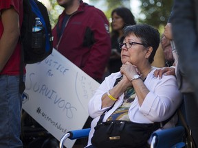 Sixties Scoop survivor Dokis Thibault is emotional as she gathers with supporters at a rally in Toronto on Tuesday, August 23, 2016. Scores of aboriginals from across Ontario rallied in Toronto today ahead of a landmark court hearing on the so-called '60s Scoop.
