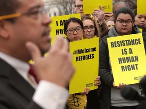 .S. Rep. Keith Ellison (D-MN) speaks during a news conference in front of the Capitol February 1, 2017