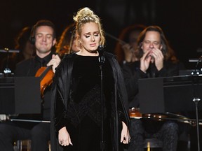 Adele wore Givenchy Haute Couture by Ricardo Tisci — twice.