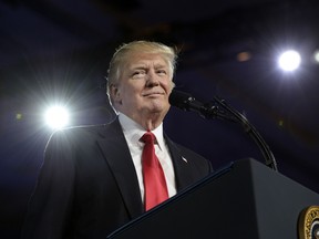 Trump pauses while delivering remarks to the Conservative Political Action Conference (CPAC) on February 24, 2017 in National Harbor, Maryland