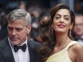 George Clooney and Amal Clooney attend the premiere for Money Monster at the Palais de Festival for the 69th Cannes Film Festival on May 12, 2016.