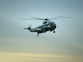 Marine One with US President Donald Trump on board, lands at Dover Air Force Base February 1, in Dover, Delaware, for the dignified transfer of Navy Seal Chief Petty Officer William "Ryan" Owens who was killed in Yemen on January 29.