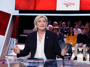 French presidential election candidate for the far-right Front National (FN) party Marine Le Pen speaks as she takes part in the show "L'Emission politique", in the studios of French television channel France 2 in Saint-Cloud, west of Paris, on January 9, 2017.