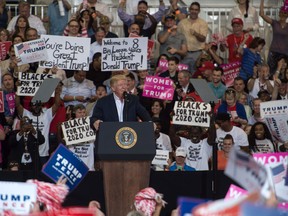 U.S. President Donald Trump addresses a rally at the Orlando Melbourne International Airport on February 18, 2017 in Melbourne, Florida.