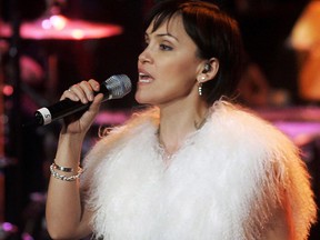 Susan Aglukark performs during the Canadian Aboriginal Music Awards on Friday, Nov. 24, 2006 in Toronto. The Inuk singer is a survivor of childhood sexual abuse, and believes the cycle of victimhood is the root cause of the suicide crisis among indigenous youth.