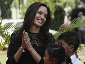 Angelina Jolie smiles before a press conference in Siem Reap province, Cambodia, Saturday, Feb. 18, 2017. Jolie on Saturday launched her two-day film screening of First They Killed My Father.