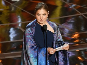 Anousheh Ansari accepts Best Foreign Language Film for The Salesman on behalf of director Asghar Farhadi onstage during the 89th Annual Academy Awards.