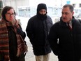Will Baker, centre, formerly known as Vince Li, leaves the Law Courts building in Winnipeg, after his annual criminal code review board hearing with his lawyer, Alan Libman, right, Monday, February 6, 2017. Baker was found not criminally responsible of the 2008 gruesome killing of a fellow passenger on a Greyhound Bus.