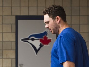 Toronto Blue Jays pitcher Joe Biagini walks back to the clubhouse after medical testing in Dunedin, Fla., on Feb. 14.
