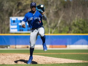 Toronto Blue Jays starting pitcher Marcus Stroman catches a ball during spring training in Dunedin, Fla., on Feb. 20.