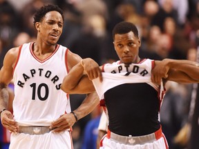 Toronto Raptors guards DeMar DeRozan (10) and Kyle Lowry react after losing to the Detroit Pistons on Feb. 12.