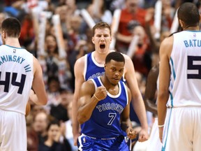 Raptors guard Kyle Lowry celebrates hitting a three-pointer during second half action against the Charlotte Hornets at the Air Canada Centre in Toronto on Wednesday night.