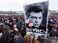Russians gather in memory of opposition leader Boris Nemtsov in St. Petersburg on Sunday, Feb. 26, 2017, two years after his death.