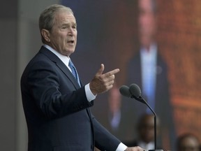 In this Sept. 24, 2016 file photo, former President George W. Bush speaks in Washington