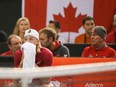 Denis Shapovalov of Canada reacts to hitting chair umpire Arnaud Gabas in the eye with a ball on Feb. 5.