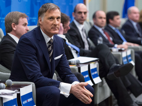 Maxime Bernier and other Conservative Party leadership candidates at a debate Monday, Feb. 13, 2017 in Montreal.