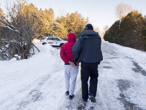 A young man from Yemen is arrested by an RCMP officer after crossing the U.S.-Canada border into Canada near Hemmingford, Que., on Friday, February 17, 2017. A number of refugee claimants are braving the elements to illicitly enter Canada.