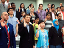 New Canadians swear an oath at a citizenship ceremony in 2016.