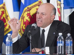 Kevin O'Leary makes a point at the Conservative leadership candidates' debate, in Halifax on Saturday, Feb. 4. His opponents took aim at his lack of political experience.