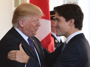 Donald Trump greets Justin Trudeau at the White House in February.
